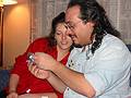 Jan 6, 2002 - At Marie's in Lawrence, Massachusetts.<br />Holly and Carl looking at a belated Christmas present.