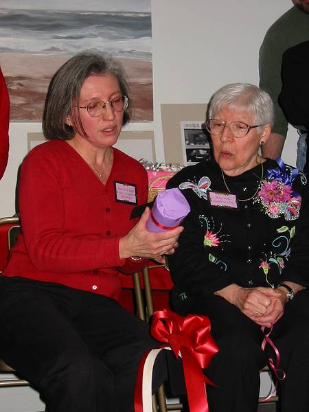 Jan 20, 2002 - At Paul and Norma's in Tewksbury, Massachusetts.<br />Marie's 80th birthday party.<br />Joyce doling out Marie's presents.