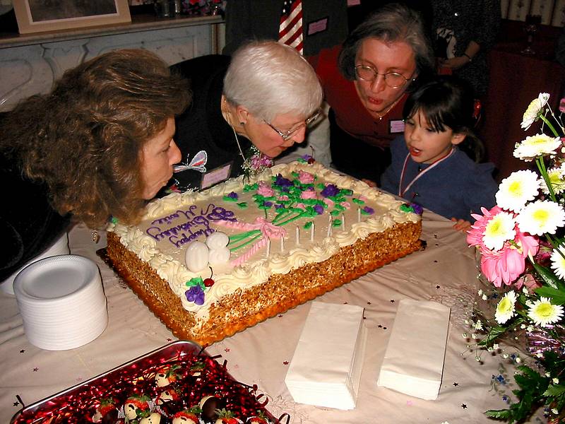 Jan 20, 2002 - At Paul and Norma's in Tewksbury, Massachusetts.<br />Marie's 80th birthday party.<br />Kim A. and Joyce helping Marie blow out the candles.