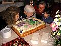 Jan 20, 2002 - At Paul and Norma's in Tewksbury, Massachusetts.<br />Marie's 80th birthday party.<br />Kim A. and Joyce helping Marie blow out the candles.