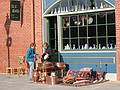 March 21, 2002 - Fells Point section of Baltimore, Maryland.<br />Baiba and Joyce examining some of the wares.