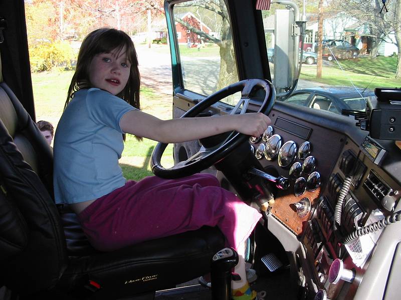 April 25, 2002 - At the Goulds' on Abbott Street, Merrimac, Massachusetts.<br />Dagbjrt in George Gould's tractor.