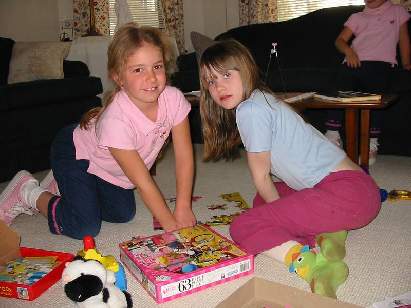 April 25, 2002 - Merrimac, Massachusetts.<br />Marissa and Dagbjrt playing in the living room.