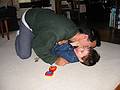 April 29, 2002 - Merrimac, Massachusetts.<br />Eric kissing Gujn on the living room rug..