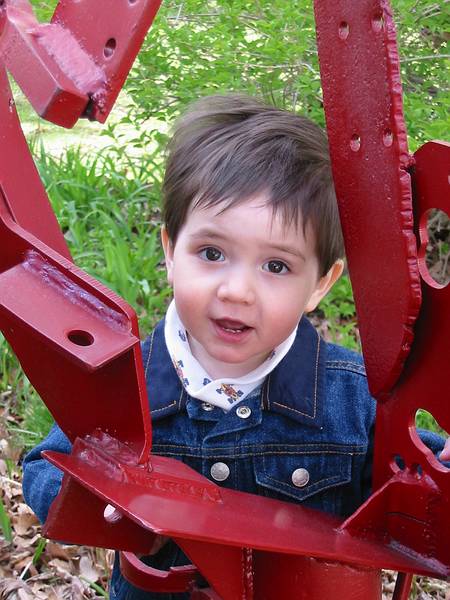 May 1, 2002 - Merrimac, MA.<br />Gujon on "G-Force" (Joyce's sculpture).