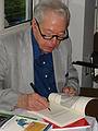 May 30, 2002 - Firehouse Center for the Arts, Newburyport, MA.<br />Poet William Jay Smith signing a book for Joyce and Egils.<br />Some of his books contain illustration of woodcuts by Jacques Hnizdovsky,<br />whose woodcats were being shown here and tonight being the show opening.