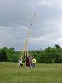 June 2, 2002 - Maudslay State Park, Newburyport, Massachusetts.<br />Outdoor sculpture exhibit picture taking (for the catalog) day.<br />Bert Snow, Eric Olson (the sculptor), and others fighting the wind.