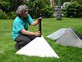 June 17, 2002 - Moses-Kent House Museum, Exeter, New Hampshire.<br />Outdoor sculpture exhibit.<br />Joyce installing her sculpture "Kinetic Forces Uplifted".