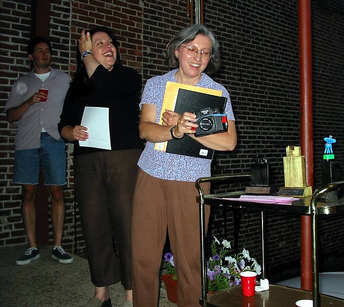 June 28, 2002 - 77 Elm Street, Amesbury, Massachusetts.<br />Jodi and Joyce holding the Holga all plastic (including lens) camera