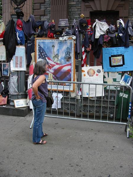 July 4, 2002 - New York, New York.<br />Joyce in front of 9/11 memorabilia in front of St. Paul's Chapel.