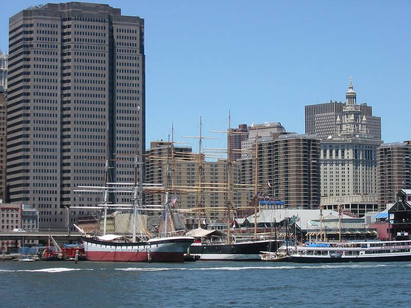 July 5, 2002 - New York, New York.<br />Tall ships at Pier 17 and other lower Manhattan buildings..