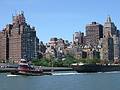 July 5, 2002 - New York, New York.<br />A tug boat pulling a barge in the East River.