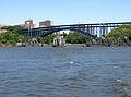 July 5, 2002 - New York, New York.<br />The blue Henry Hudson Bridge connecting the Bronx and Manhattan<br />and the open railroad bridge at the northern tip of Manhattan.