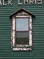 July 17, 2002 - Long Lake, New York.<br />An Adirondack window on Hoss's store.