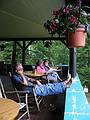 July 18, 2002 - Hemlock Hill Resort, Blue Mountain Lake, New York.<br />Ronnie, Joyce, and Baiba on the porch of the main building.