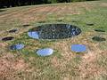 Aug 10, 2002 - Evergreen House, Charles Street, Baltimore, Maryland.<br />Doina Adams, "Silent Sky's Blueprint on Earth",<br />sculpture of reflecting stainless steel circles.