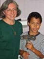 Aug 24, 2002 - Merrimac, Massachusetts.<br />Joyce and Eriks with sculptural object that he welded together at Joyce's studio.