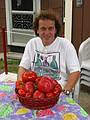 Sept 1, 2002 - At Marie's in Lawrence, Massachusetts.<br />Paul and a batch of his tomatoes.
