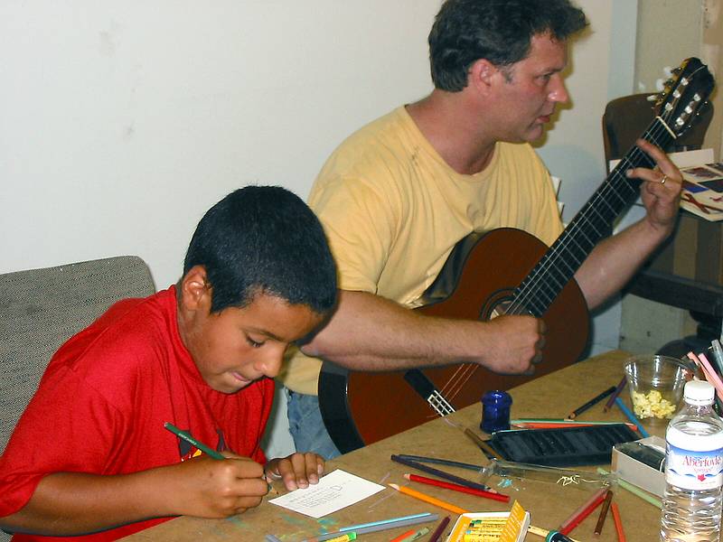 Sept 7, 2002 - Amesbury Artworks, 10 R Street, Amesbury, Massachusetts.<br />Pictogram Project for the benefit of the Amesbury family of Robert Hayes, who died on AA Flight 11 on 9/11/2001.<br />Jeb Dubus with guitar.