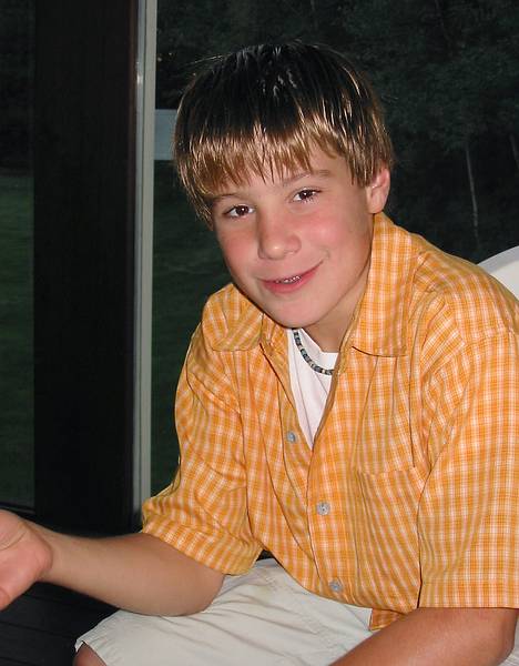 Sept 13, 2002 - At Oscar and Leslie's in North Andover, Massachusetts.<br />Oscar's birthday celebration.<br />Julian.