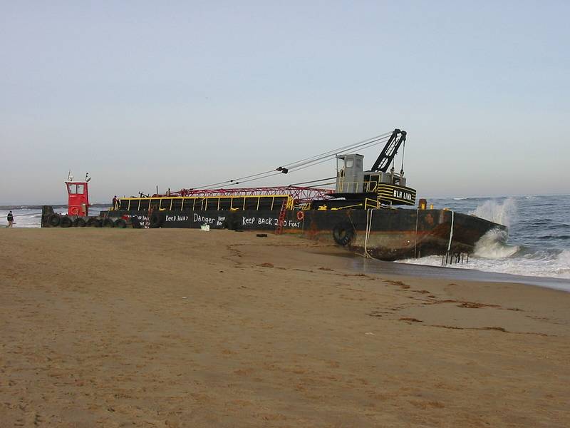 Dec 13, 2002 - Plum Island, Massachusetts.<br />Barge and its tugboat which were beeched the evening of Dec 11<br />after the tug boat lost control of the barge in the mouth of the Marrimac River.