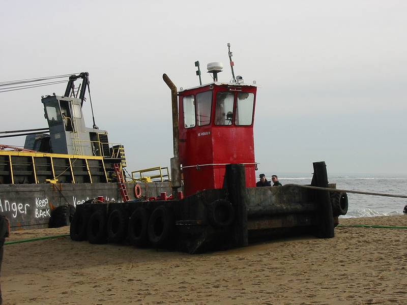 Dec 13, 2002 - Plum Island, Massachusetts.<br />Barge and its tugboat which were beeched the evening of Dec 11<br />after the tug boat lost control of the barge in the mouth of the Marrimac River.