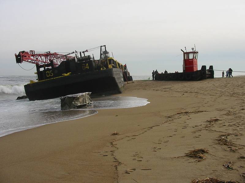 Dec 13, 2002 - Plum Island, Massachusetts.<br />Barge and its tugboat which were beeched the evening of Dec 11<br />after the tug boat lost control of the barge in the mouth of the Marrimac River.