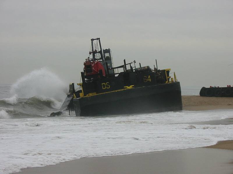 Dec 13, 2002 - Plum Island, Massachusetts.<br />Barge and its tugboat which were beeched the evening of Dec 11<br />after the tug boat lost control of the barge in the mouth of the Marrimac River.
