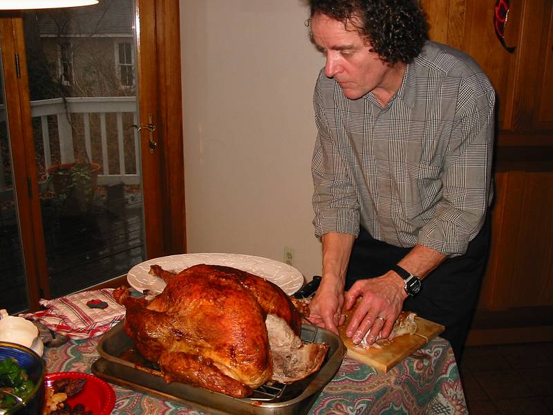 Dec 25, 2002 - Merrimac, Massachusetts.<br />Paul carving the turkey.