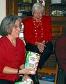 Dec 25, 2002 - Merrimac, Massachusetts.<br />Joyce showing her "Notta Pasta" gift from Paul and Norma while Marie watches.