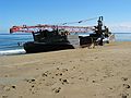 Feb 26, 2003 - North end of Plum Island, Massachusetts.<br />Grounded crane barge which was destined for the "Chain" bridge.