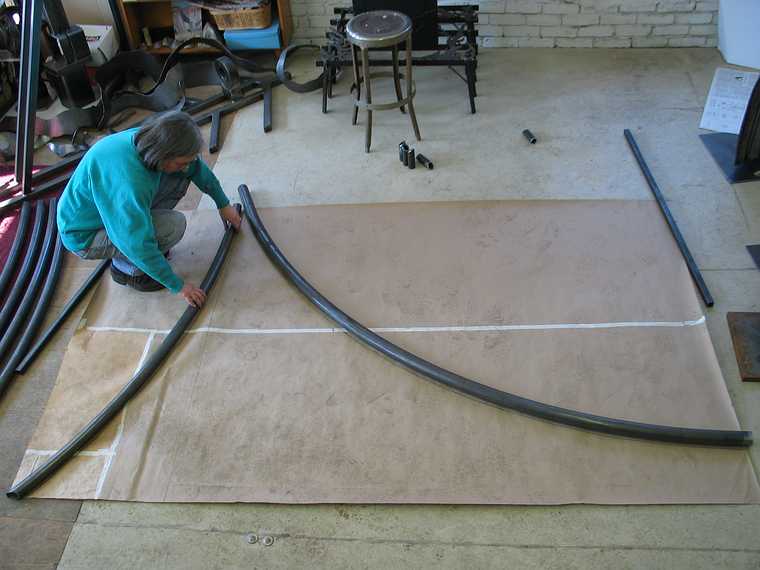 March 4, 2003 - Joyce's studio in Amesbury, Massachusetts.<br />Chicago's Navy Pier Project.<br />Joyce placing a pine needle next to the pine cone core.