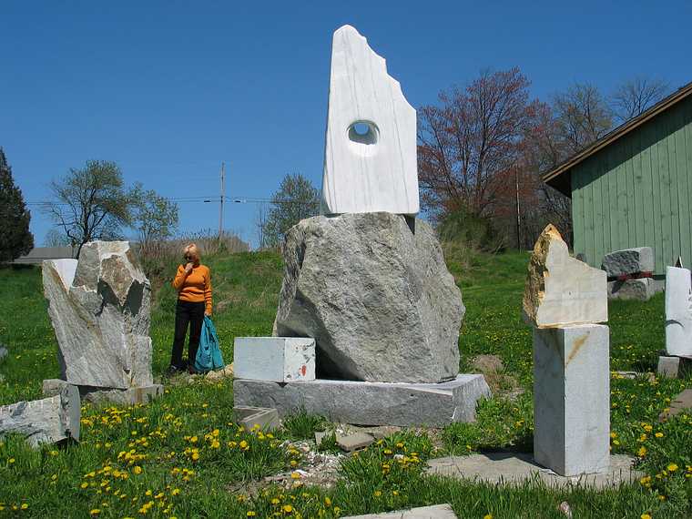 May 17, 2003 - Eliot, Maine.<br />Antoinette Prien-Schultze's home/farm.<br />Toni among her sculptures.