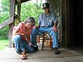 June 15, 2003 - Along NC-276 in the Pisgah National Forest, North Carolina.<br />Cradle of Forestry in America.<br />Joyce and a local craftsman, builder of the tops.