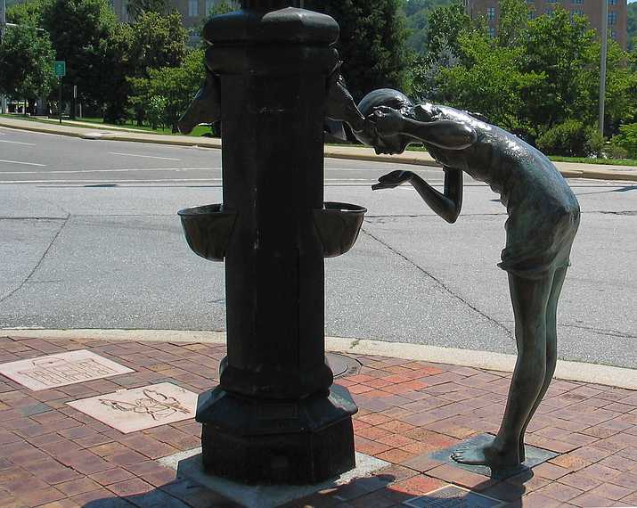 June 21, 2003 - Asheville, North Carolina.<br />Along the trail of the Era of Civic Pride.<br />Asheville's little girl in bronze represents the future of Asheville.