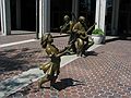June 21, 2003 - Asheville, North Carolina.<br />On the Guilded Age trail: Appalachian Stage. Quilt and fiddle on bench and five dancers<br />and musicians mark the significance of Appalachian culture on the community.