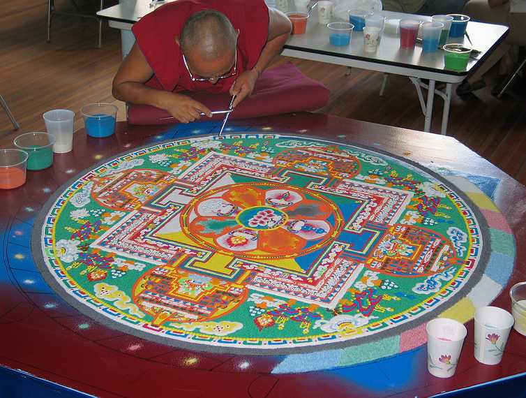 Aug 15, 2003 - Amesbury, Massachusetts.<br />Tibetan monks working on a sand mandala<br />at Saint James Episcopal Church on Main Street.