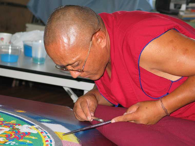 Aug 15, 2003 - Amesbury, Massachusetts.<br />Tibetan monks working on a sand mandala<br />at Saint James Episcopal Church on Main Street.