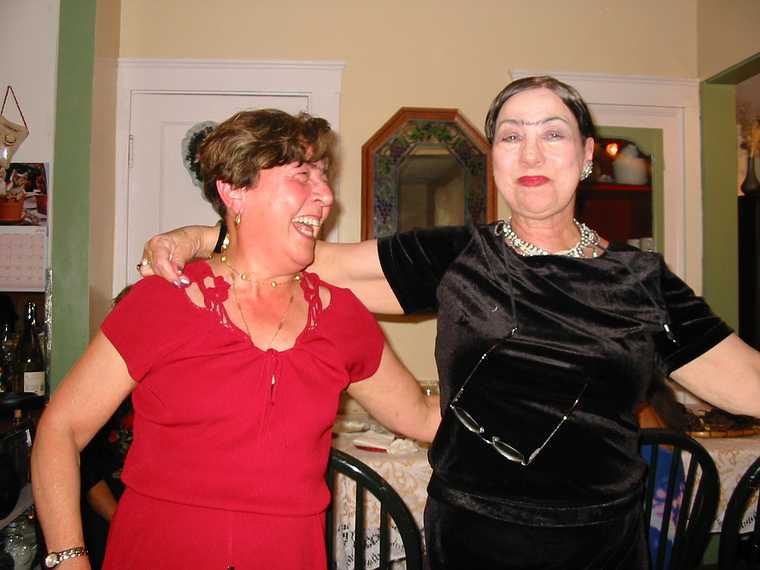 Aug 30, 2003 - Malden, Massachusetts.<br />Party at Ana's house to celebrate renovations to her apartment.<br />Ana and friend with Frida Kahlo eyebrows.