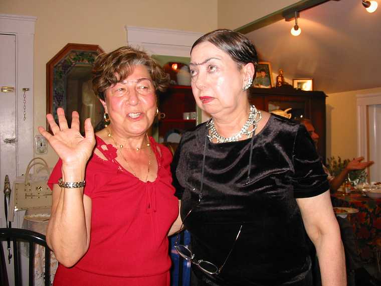 Aug 30, 2003 - Malden, Massachusetts.<br />Party at Ana's  house to celebrate renovations to her apartment.<br />Ana and friend with Frida Kahlo eyebrows.