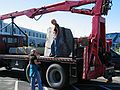 Oct 13, 2003 - Newburyport, Massachusetts.<br />Antoinette Prien Schultze installing her sculpture "Aurora" at Somerby's Landing.