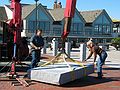Oct 13, 2003 - Newburyport, Massachusetts.<br />Antoinette Prien Schultze installing her sculpture "Aurora" at Somerby's Landing.