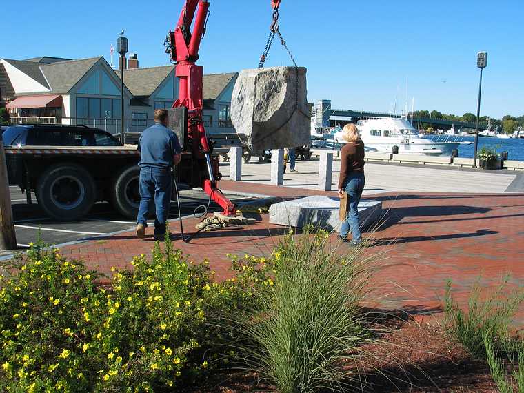 Oct 13, 2003 - Newburyport, Massachusetts.<br />Antoinette Prien Schultze installing her sculpture "Aurora" at Somerby's Landing.