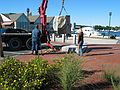 Oct 13, 2003 - Newburyport, Massachusetts.<br />Antoinette Prien Schultze installing her sculpture "Aurora" at Somerby's Landing.