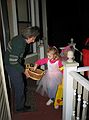 Oct 31, 2003 - Halloween, Merrimac, Massachusetts.<br />Joyce offering treats.