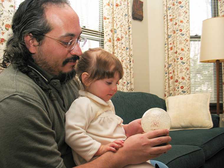 Dec 21, 2003 - Merrimac, Massachusetts.<br />Christmas tree decorating party.<br />Carl and Miranda.