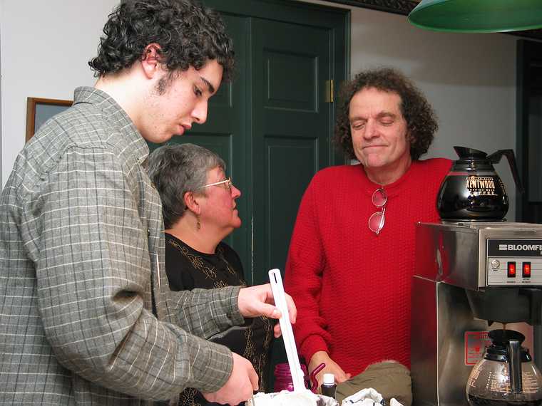 Dec 25, 2003 - At Tom and Kim's in South Hampton, New Hampshire.<br />TJ making a dessert, Norma, and Paul.