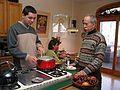 Dec 27, 2003 - Merrimac, Massachusetts.<br />Melody's 30th and Miranda's 2nd birthday celebration.<br />Sati making creme brulee, Ronnie watching, and Melody.