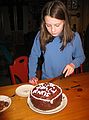Jan 18, 2004 - Sunday River, Maine.<br />At the Cunninghams' ski lodge.<br />Lydia and her chocolate cake.