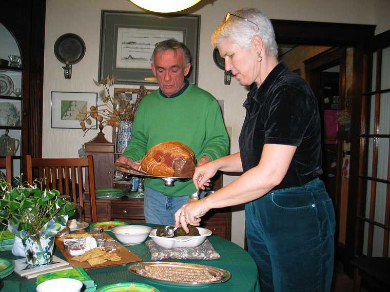 March 21, 2004 - Amesbury, Massachusetts.<br />At Deb and Ray's house for Saint Patrick's Day party.<br />Ray and Deb serving food.
